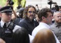 Russell Brand arrives at London court to face sexual assault charges