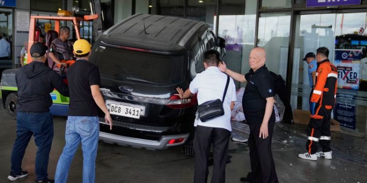 Four-year-old girl and man dead after driver crashes SUV into Manila airport, Red Cross says