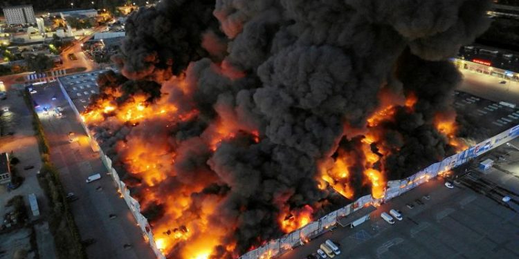 Poland blames Russian intelligence for arson attack on Warsaw shopping center last year