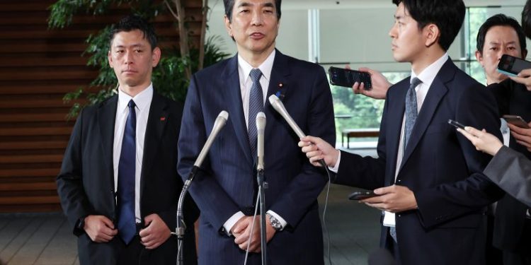 Japan’s farm minister resigns over rice gaffe, as stubbornly high prices threaten government’s grip on power