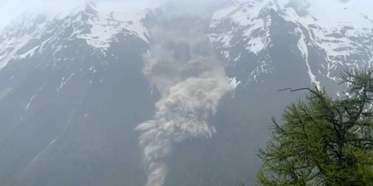 Mud and rock buries evacuated Swiss village after glacier collapse, one person missing