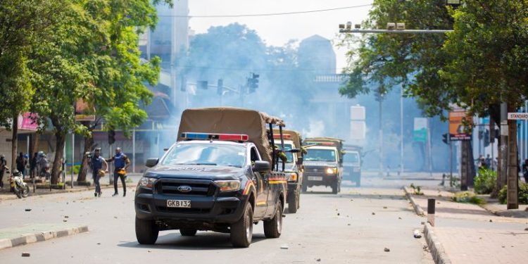 Police fire teargas and water cannon at protesters in Kenya as thousands take to the streets
